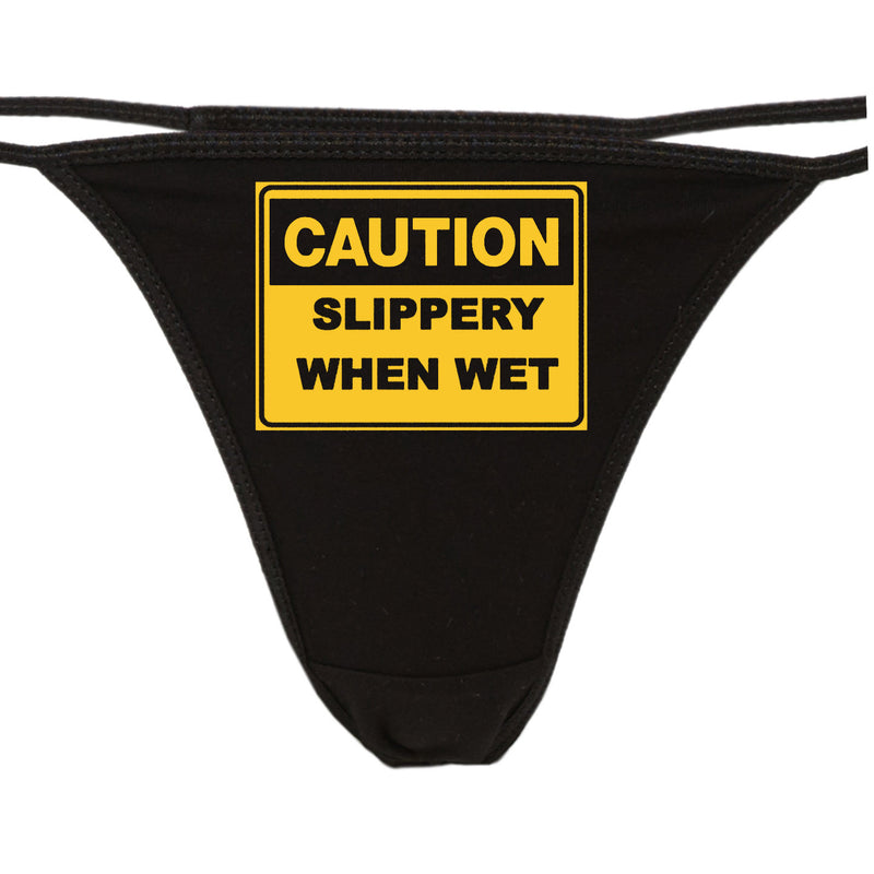 CAUTION, SLIPPERY WHEN WET - BLACK THONG